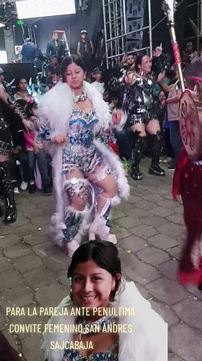 Elaborate Costume Dance Parade in Festive Atmosphere