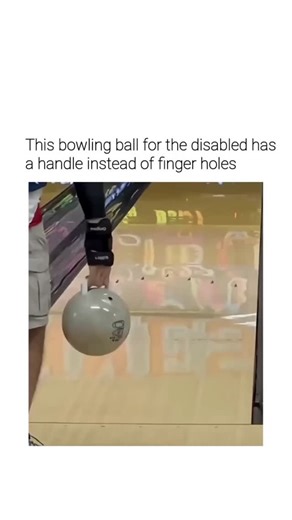 @viraltok.pro on Instagram: "The post highlights a retractable-handle bowling ball designed for individuals with upper-limb disabilities, featuring a spring-loaded mechanism that folds the handle below the surface upon release for smooth rolling. This adaptive equipment, available from specialist retailers like Innovative Bowling, enables precise control and equal participation in ten-pin bowling without traditional finger grips. Replies blend humour—such as quips about superior skills—with prai