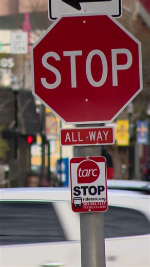 Downtown Louisville trading stop lights for stop signs