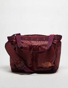 The North Face Base Camp Voyager tote bag in red | ASOS