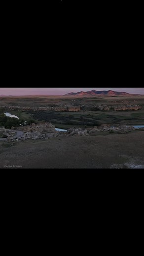 Writing on a mountain... Writing On Stone Provincial Park. Located in approx. 100kms south of Lethbridge in Southern Alberta Canada on the border of Montana USA is this underrated hidden gem full of majestic scenery and breathtaking views. Wildlife galore, mountains, gorgeous sunsets, hoodoos, and petroglyphs. It is definitely recommended to check this place out. like, share & follow to keep up with Drone Aerials . . #mountain #sunset #beautiful #nature #drone | Drone Aerials