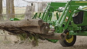 Learn how to clean up materials around your property using a pallet fork grapple: https://bit.ly/3fQ3txY | Machinefinder