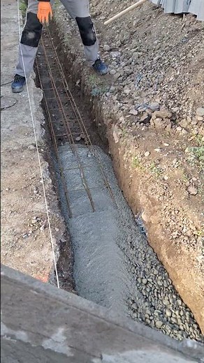 Concrete foundation pouring for a stone and Paul boundary wall, all types of work