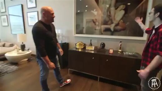 🥋🇺🇸 UFC PRESIDENT DANA WHITE's PAINTINGS ON WALL:🤔 When showing off a title belt, Dana had a painting of a s3x act behind him.🤔 AND, a portrait of child with blue butterflies 🦋—sign associated with mind control (MK-Ultra Monarch) & s3x trafficking survivors....