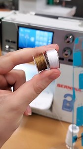 It can be hard to wind the perfect bobbin on your machine! But this technique gives you a little more control while winding creating a more even, and neat bobbin 🤩 Typically people will put their thread on their machine's thread stand while winding a bobbin. But if you place the thread on an independent stand, like the WonderFil Thread Tamer, you can instead place it in front of your machine. This allows you to have more control over the thread as you wind your bobbin, and makes it easier to ke