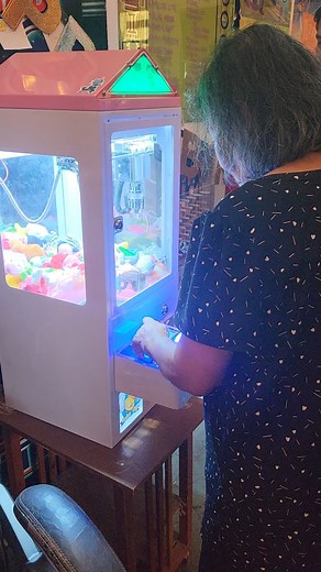 We let Mom take a crack at the claw machine, and now she won't stop until she has collected all of the prizes. We have created a monster. #MommyKnowsBest #Arcade #BarArcade #Pinball #RetroGaming #FamilyFriendly #PartyTime #SupportLocalBusinesses #VeteranOwned #AsianOwnedBusiness #WomenOwnedBusiness #SouthavenMS | GameOver Arcade Bar