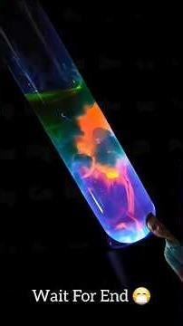 The Chemistry of Light: A Dazzling Fluorescent Reaction 🌈 #shorts #LightAndMatter #ScienceVideo
