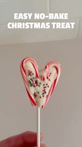 These Candy Cane Heart Pops are so simple and festive! No bake & just 2 needed ingredients. Mini candy canes shaped into a heart, filled with melted white chocolate, topped with sprinkles, and set on a stick. Easy enough for kids to help. Perfect for December parties, gifting to neighbors, or a fun afternoon activity with the kids. I shared the full how-to on Teach Beside Me. #christmascrafts #holidaytreats #easychristmas #kidscrafts #ediblecrafts #holidayfun #teachbesideme | Teach Beside Me
