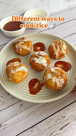Let’s change things up a bit by deep frying some rice! Here’s my Cheesy Fried Rice Balls recipe BiteFam 🍚🧀 Rice Rice Baby: Episode 3 - Cheesy Fried Rice Balls (inspired by Arancini / Croquettes) INGREDIENTS - 3 Cups of White Rice - 5 Cloves of Garlic - 2 Eggs - 1 Cup of Mozzarella Cheese - 1 1/2 Cup of Bread Crumbs - 1 Cup of Flour - Salt and Pepper, to taste - Oil, for garlic rice and deep frying Serve with a sauce like garlic sauce and marinara sauce. Enjoy guys! Yield: 5-7 rice balls, depen