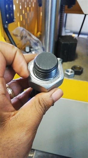 HELICOIDAL THREAD STRIPS DURING PROOF LOAD TEST ON STEEL NUT USING HARDENED BOLT AS MANDREL