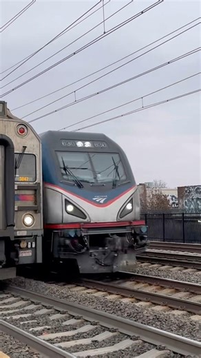 NJT 3847 pulling into Jersey Ave with Amtrak 93 racing behind with Amtrak 630 leading 11/21/2025
