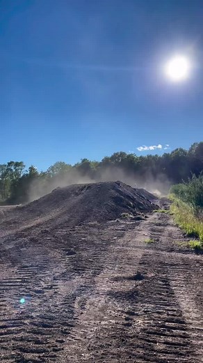 Dirt Bike Stunt Performance on Rugged Track