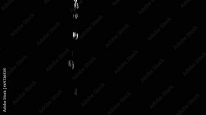 Transparent Drops of Water Fall with Splashes on an Empty Black Background. Blurred motion. Splash, a spray of clean water drops like a diamond. Texture. Copy space. Close up. Isolated. Slow motion. Stock Video