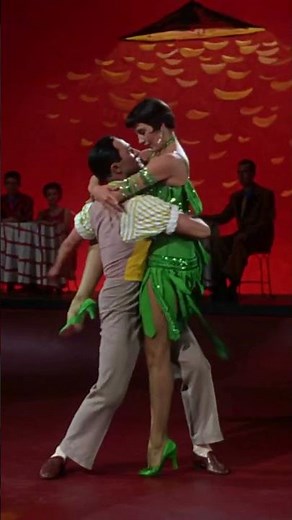 One of the most iconic scenes of classic film: Cyd Charisse & Gene Kelly in 'Singin' in the Rain'