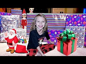Christmas Morning Opening Presents From Santa