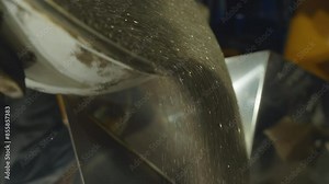 Pouring Gold Dust Rich Metal Into Processing Container. Shiny Rich Gold Dust For Jewelry Production. Rich Gold Dust Extraction Facility. Precious Metal Manufacturing. Pure Material. Foundry. Treasure