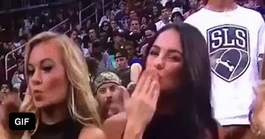Beard guy blowing kisses photobomb - GIF