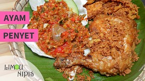 AYAM PENYET Resepi ayam : - 1/2 ekor ayam - 4 hiris tempe - 1 biji tauhu - 2 biji bawang merah - 1 ulas bawang putih - 1cm kunyit hidup - 2 hiris lengkuas - 1 sk garam - 1 sk gula - 250ml santan - 200ml air Bancuhan tepung: - 200ml air rebusan ayam - 150g tepung beras - 1 biji telur - 1 sk garam - 1/2 sk gula Bahan sambal penyet: - 2 biji cili merah - 18 biji cili api - 1cm belacan bakar - 2 ulas bawang putih - 1/2 biji bawang holland - 1/2 biji tomato - 1/4 sk garam - 1 sb gula melaka Bahan tam