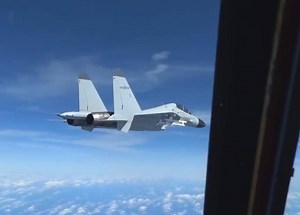 VIDEOS: Chinese fighter makes unsafe interception of US spy plane