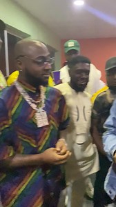 magician pulls out card from Davido's ear | Babs Cardini