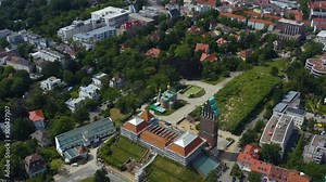 Aerial view of the city Darmstadt in Germany. On a sunny day in Summer. Pan to the right around the Matildenhöhe.
