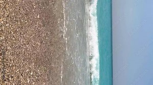 View of the amazing Oludeniz beach and the Blue Lagoon, the best beach in Turkey, Fethiye. Kidrak Beach. Mediterranean bays with blue water. Oludeniz Lagoon. Turkey. 4K