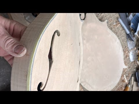Assembling a Mandolin body, glueing the back on to an F5 rim ￼