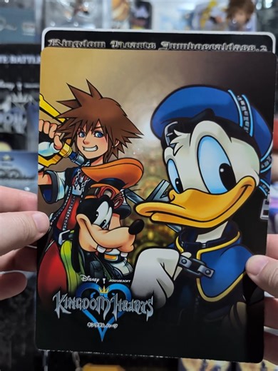 Kingdom Hearts Original Sealdass Sticker Collection Card Set No.2 By Bandai in 2003 in Japan! Continuing from yesterday, this is the second card of the set! No.1 features Sora, Riku, and Kairi and No.2 features the main boys this time! The inside of this one is also different, featuring the first couple worlds you visit in the game and Disney Castle which was shown first as well. Has all sorts of things from character art, to Disney character specific stickers as well! Also really like the color