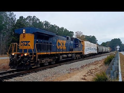 CSX L645 Rolls Through Slighs On The CN&L Subdivision With CSXT 7114 Running Long Hood Forward