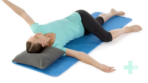 Thoracic rotations in side lying (open book) - Version 2 Lie on your side with your arms outstretched on the floor in front of you. Your lower leg should be straight and in line with the rest of your body. Your upper leg should be bent in front of you with both the hip and knee at 90 degrees. You may wish to rest your upper leg on pillows or a foam roller. Take a deep breath in. As you breathe out, lift your top arm up from the floor towards the ceiling. Follow the movement with your head. Conti