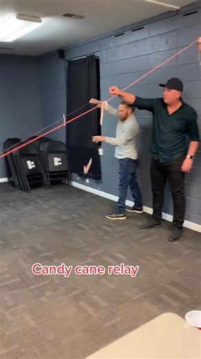 Rob Shepherd on Instagram: "Easy and fun game for Christmas. Teams try to get the candy cane to their partner without it falling. Alternative option is to run it back to your teammate. #christmasgames"