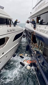 Two Luxury Yachts Collide at Sea… Owners Argue and One Falls In 🛥️ Two luxury yachts crash in open water. The owners rush out yelling and blaming each other—then one of them slips mid-argument and falls straight into the sea. Everyone’s filming like… how is this real?! #yacht #ocean #crash #fail #stupid | The.worldai
