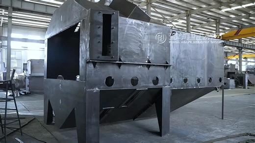 Bare Metal Strength. The Core Framework. ⚙️🔥 This is the robust heart of our roller conveyor shot blasting machine — the main chamber in its true form after welding completion. Massive steel plates are joined through precise welding techniques, with every seam pursued for uniformity, strength, and density, forming the enduring "skeleton" for the machine's future stable operation. At this moment, uncoated, it showcases the purest industrial structure and manufacturing craftsmanship. The next ste