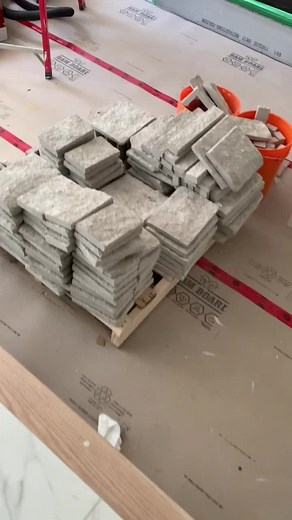 What you guys think about this gorgeous fireplace #tile #tiling #foryoupage #fypシ #transformation #fireplace #stonework #howto