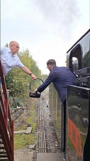 A token grab with a small steam at Ramsbottom #train #railway #shorts