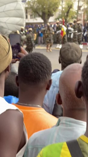 Outdoor Event Featuring Military Drills and Flag Marching