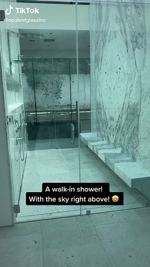 How cool is this walk in shower with a the sky right above you?!? #GlazingRedefined #luxuryliving #luxurylifestyle #homedecor #architecture #