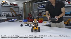 This is a detailed explanation video of LESU AT1050 telescopic loader. It has many attachments available. | Toucanhobby