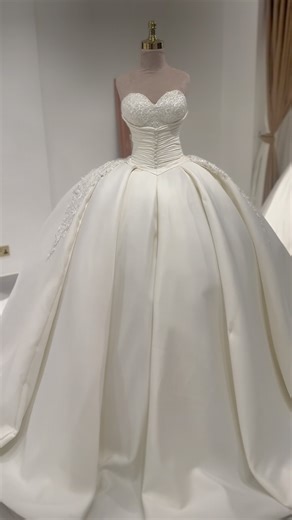 A timeless silhouette crafted for the bride who loves elegance in its purest form. The sculpted corset, the sweeping satin skirt, the subtle sparkle — a gown made to honour tradition while embracing modern luxury. For our traveller and Irish brides who deserve nothing less than breathtaking. #travellerbride #irishwedding #irishbride #ukbridetobe #luxurybridalwear #ballgowndress #victorianbridal #weddingdressinspo #bridetobe2025 #sayyestothedress #londonbridalboutique #bridalfashion | Thevictoria