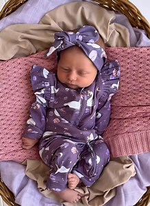 Wait for the little look…… 👀 Looking super snuggly in our Midnight Swan Snugglesuit 💜 Shop online…. https://snugglehunnykids.com.au/collections/up-above | Snuggle Hunny
