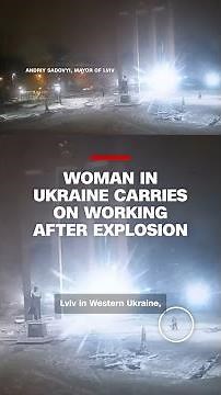 Woman in Ukraine carries on working after explosion