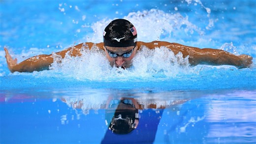 Urlando earns first world title in men's 200m fly