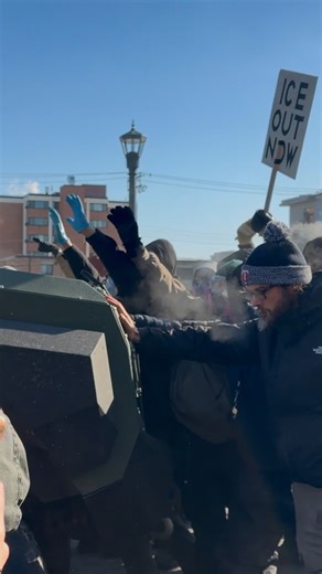 Protesters attempting to block an armored vehicle from advancing earlier today in Minneapolis | BG On The Scene