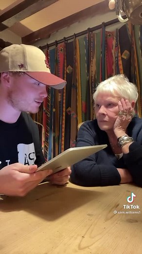 Judi Dench playing 'Finish The Lyric' with her grandson, Sam, is everything you need to see today. © TikTok @Sam.Williams1 | British Vogue