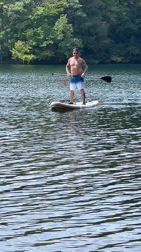 A perfectly executed hand stand on the paddle board!! | Bill Milner