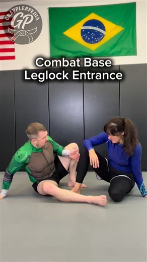 Rolling leg lock entry from combat base. 😈 #jiujitsu #grapplerpedia #grappling | GrapplerPedia