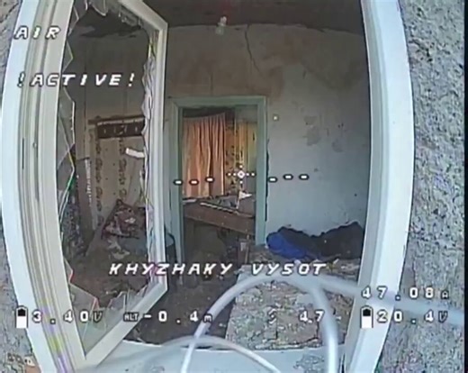 FPV drone scouts a building for Russian infantry from the inside