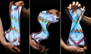 This new flexible display using contact lens materials can be pulled, stretched up to half its length, twisted, and folded up