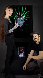 You may have seen our System Shock cosplay, but we not only built a S.H.O.D.A.N. cosplay, we also built a pretty cool display of S.H.O.D.A.N.s head. It was set up at Gamescom 2022 at the System shock booth. In the bottom part there is a space where we put the original game from 1994, and I am pretty sure some kids at Gamescom have never seen a disk before. Fun fakt: The head we built for the display is 30% bigger than the one we made for the cosplay. Thank you so much Prime Matter and Nightdive 