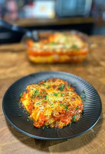 Try this easy 5 ingredient lasagna recipe! CJ is taking some premaid ravoili, spicy sausage and cream cheese to make this quick and easy lasagna. This is a great recipe for a quick weeknight dinner the whole family will love. What would you add to this lasagna? | Anyone Can Cook